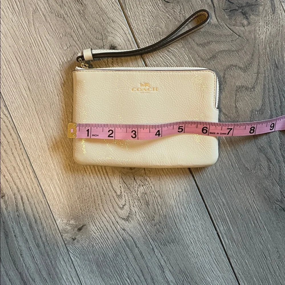 Coach Glossy Beige Wristlet